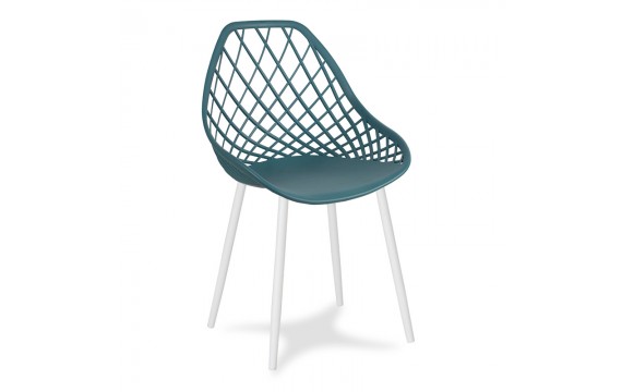 Modern Scandinavian openwork chair on metal white legs, stylish dark turquoise