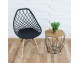 Modern Scandinavian openwork chair on wooden beech legs, stylish white