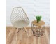 Modern Scandinavian openwork chair on wooden beech legs, stylish white