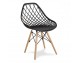 Modern Scandinavian openwork chair on wooden beech legs, stylish white