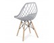 Modern Scandinavian openwork chair on wooden beech legs, stylish white