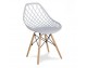 Modern Scandinavian openwork chair on wooden beech legs, stylish white