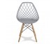 Modern Scandinavian openwork chair on wooden beech legs, stylish white