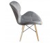 Chair on wooden beech legs upholstered with modern stylish velor for the living room office light blue