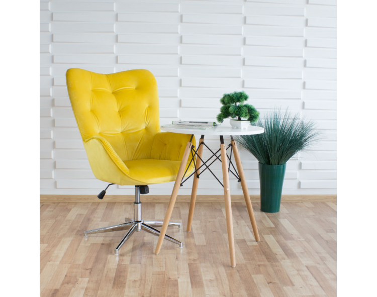 Scandinavian yellow swivel armchair with velvet wingbacks on a chrome-plated leg