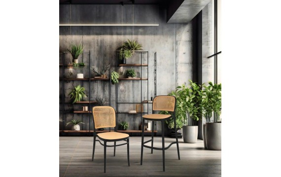 A bar stool with a footstool on wooden beech legs